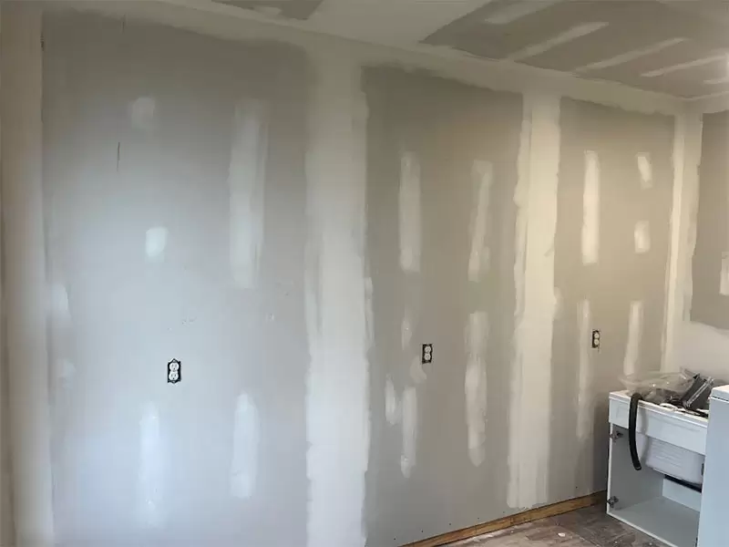Finished drywall seams mudded smooth and ready for paint